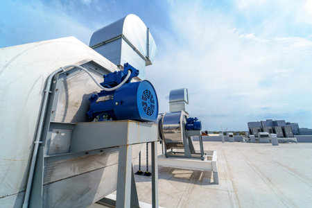 The air conditioning and ventilation system of industrial building on the roofの写真素材
