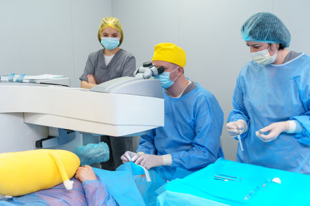 Medical Team Conducting Laser Eye Surgery with Precisionの写真素材