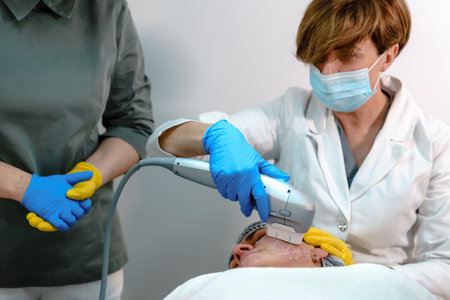 Medical Professionals Performing Facial Skin Treatment