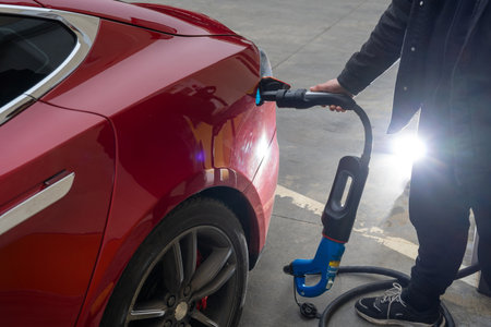 Electric Car Charging Process Close-Up View