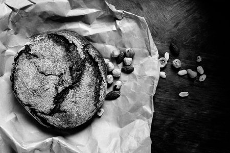 Bread and nuts on a wooden table