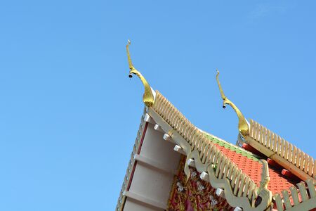 gable apex on blue sky background