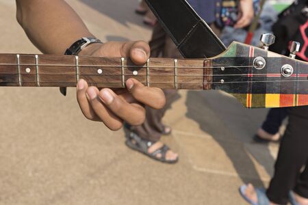 The tone of the instrument (harp) in the Northeast of Thailand.