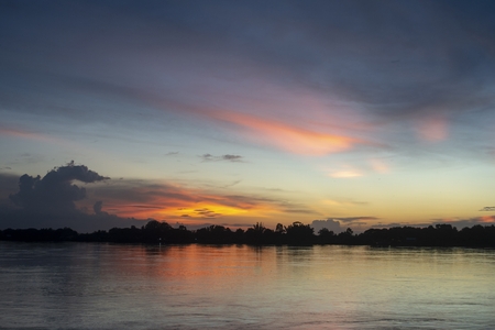 The beauty of Twilight light on the Mekong River / evening light after sunset on the Mekong River.の写真素材