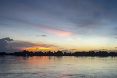 The beauty of Twilight light on the Mekong River / evening light after sunset on the Mekong River.の写真素材