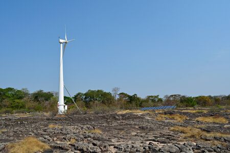 Wind turbine and solar cell system for generating electricity Clean energy is gaining in popularity in every country right now.の写真素材
