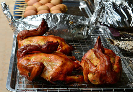 Deliciously colored baked chicken In street food storesの写真素材