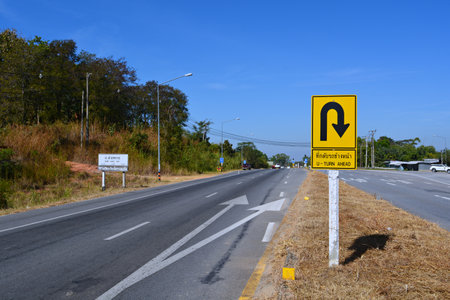 Traffic signs, U-turn points on a road in Thailandの写真素材