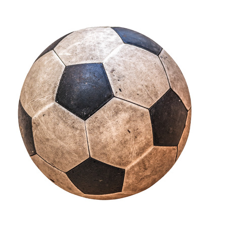 old leather soccer ball isolated on whiteの写真素材