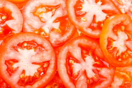 Closeup of Sliced tomato use for backgroundの写真素材