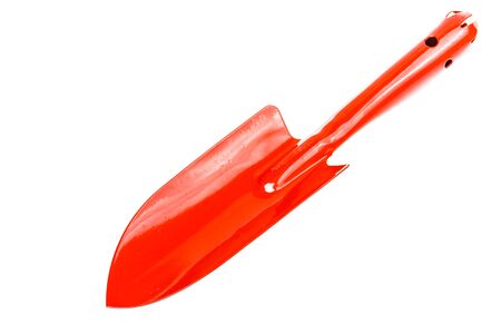 red steel shovel isolated on white backgroundの写真素材