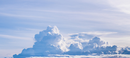 white fluffy clouds in the blue sky