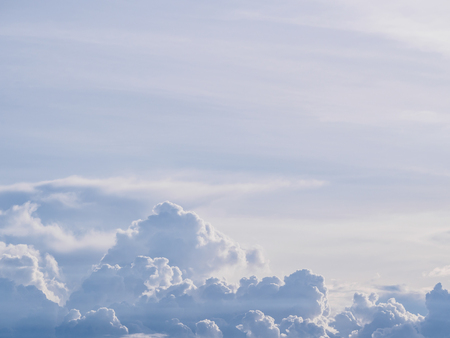 white fluffy clouds in the blue sky