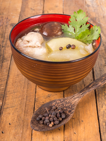 Thai food. winter melon soup with chicken and shiitake mushroom.の写真素材