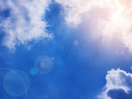 white fluffy clouds in the blue sky