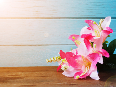 Beautiful pink flowers Put on wooden boardの写真素材