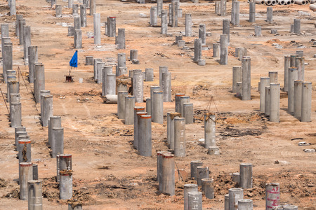 construction concrete piles of the new building at construction site.の写真素材
