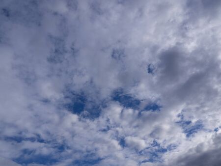 White fluffy clouds in the blue sky