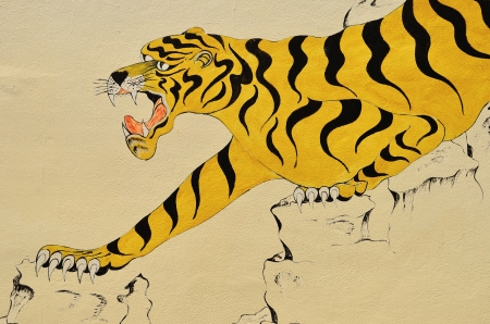 Tiger painting on wall in thai temple  Generality in Thailand, any kind of art decorated in Buddhist church etc  no restrict in copy or use の写真素材