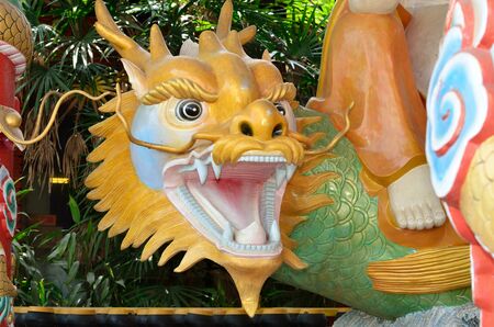 CHIANG MAI, THAILAND -Chinese style dragon statue at San Jao Mae Guan Yim (Guan Yim temple) の写真素材
