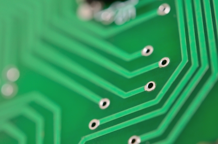 Detail of an electronic printed circuit board with many electrical componentsの写真素材