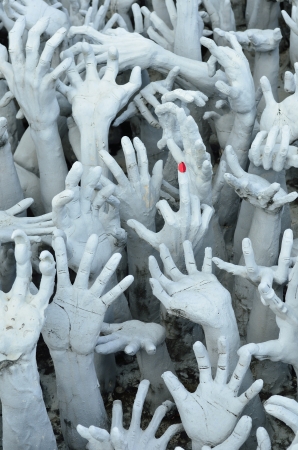 CHIANG RAI, THAILAND - NOVEMBER 21   Wat Rong Khun buildings and sculptures  on Nov 21, 2013 in Chiang Rai, Thailand   Buildings and sculptures of religion-based characters by contemporary craftsman of great skill のeditorial素材
