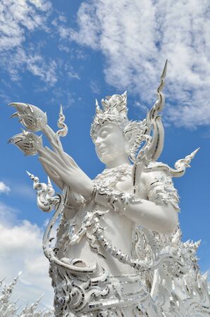 CHIANG RAI, THAILAND - NOVEMBER 21   Wat Rong Khun buildings and sculptures  on Nov 21, 2013 in Chiang Rai, Thailand   Buildings and sculptures of religion-based characters by contemporary craftsman of great skill のeditorial素材