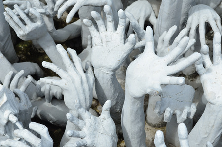 CHIANG RAI, THAILAND - NOVEMBER 21   Wat Rong Khun buildings and sculptures  on Nov 21, 2013 in Chiang Rai, Thailand   Buildings and sculptures of religion-based characters by contemporary craftsman of great skill のeditorial素材