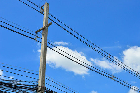 Power lines - Power Transmission Lines and blue skyの写真素材