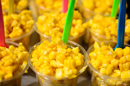 Sweet corn in plastic cap on Street Market in Thailand.の写真素材