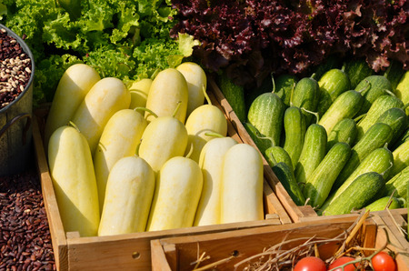 Mixed vegetables in a basket for saleの写真素材
