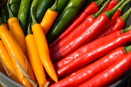 Mixed vegetables in a basket for saleの写真素材