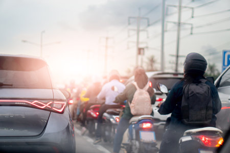 Rear side of luxury grey car with turn on brake light. Beside with many motorcycle and driver. stop...