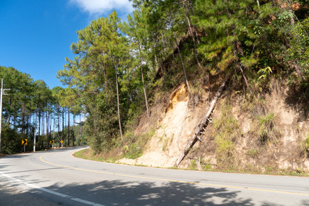 Landscape view of the asphalt road.Winding path along the edge of the mountain. Under blue sky. At Rak Chang Viewpoint, Pai, Mae Hong Son, Thailand.の写真素材