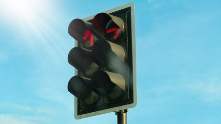 Angled view of red traffic light digital. Urban stop signal on street. Types that prohibit going...