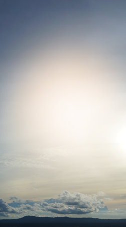 Vertical view of nature silhouette dark mountain up to the sky and gold sky. Space for general use for insert concept subject.の写真素材