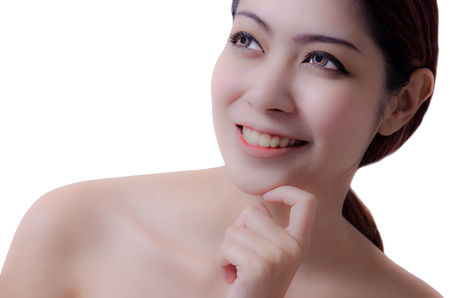 portrait beautiful girl smiling isolated with a white backgroundの写真素材