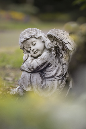 Angel sculpture made of stone in grnem Parkの写真素材