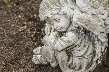 Angel sculpture made of stone in grnem Park