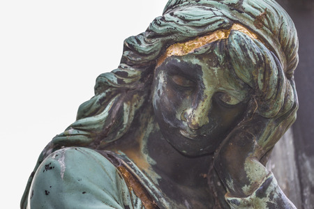 Portrait sculpture of a female figure made of metal with schwarzgrner patina.の写真素材