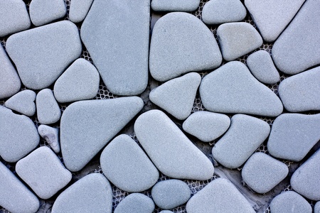 Wall made from Polished Stone show Pattern that Arrange High and Wideの写真素材