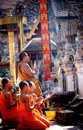 LAMPANG PROVICE, BANGKOK, THAILAND , 2009 - The Mong and Novice Pray and Walk back and forth in Buddhist holy day. LAMPANG LUANG important in North of Thailand.のeditorial素材