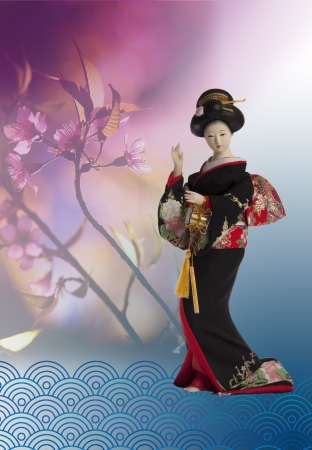 Nice Japanese Girl Dance on Pink Sakura Backgroundの写真素材
