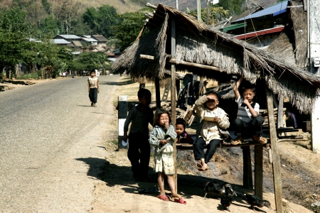 Lao Children in action at Loa Village; lao is Country in AEC.のeditorial素材