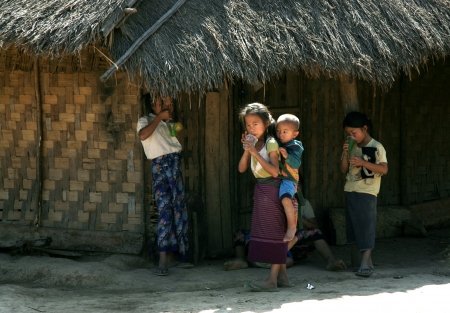 Lao Children in action at Loa Village; lao is Country in AEC.のeditorial素材