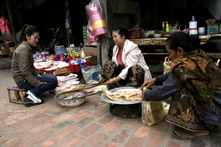 People In Lao Market sell and buy Fruit, Vegetable, Meat from The Farm and Wild Animalのeditorial素材