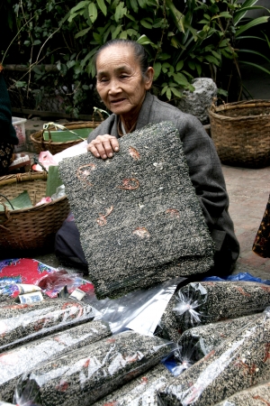 People In Lao Market sell and buy Fruit, Vegetable, Meat from The Farm and Wild Animalのeditorial素材