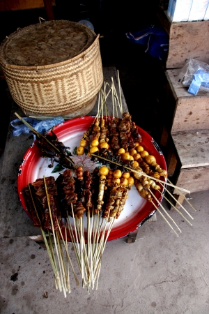 People In Lao Market sell and buy Fruit, Vegetable, Meat from The Farm and Wild Animalの写真素材