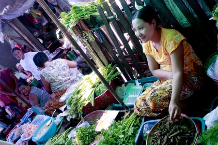 Lifestyle of Myanmar People. Old style Market or Grocery sell food, meat, fish, vegetable,canned food,tobacco leaf, garment, gold, gem, electronic, computer, mobile and etc.のeditorial素材
