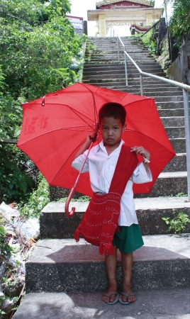 Student wear sarong go to school.Lifestyle of Myanmar People still wear sarong and worship Buddhism.のeditorial素材